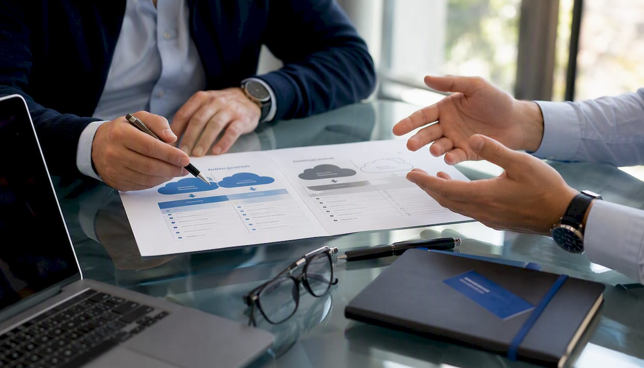 Hands comparing software deployment options
